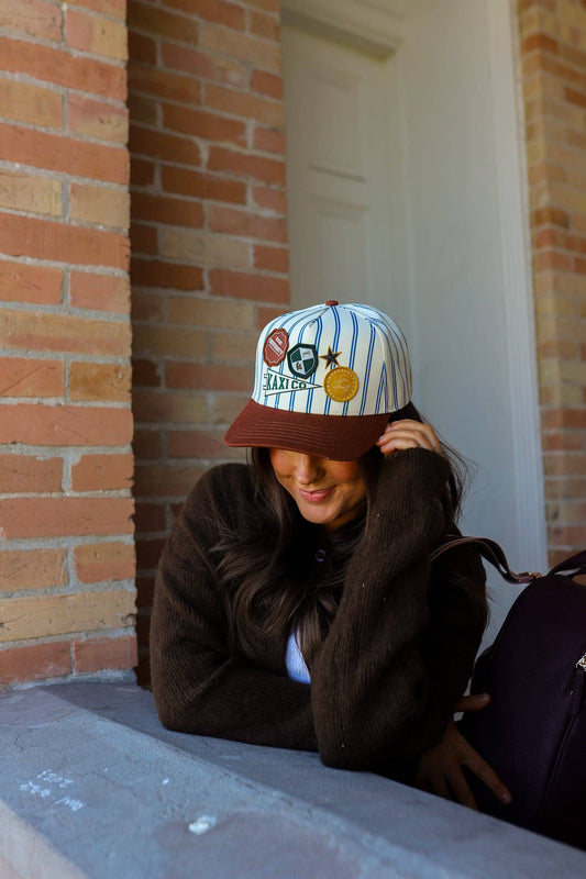 KAXI UNIVERSITY PATCH TRUCKER HAT