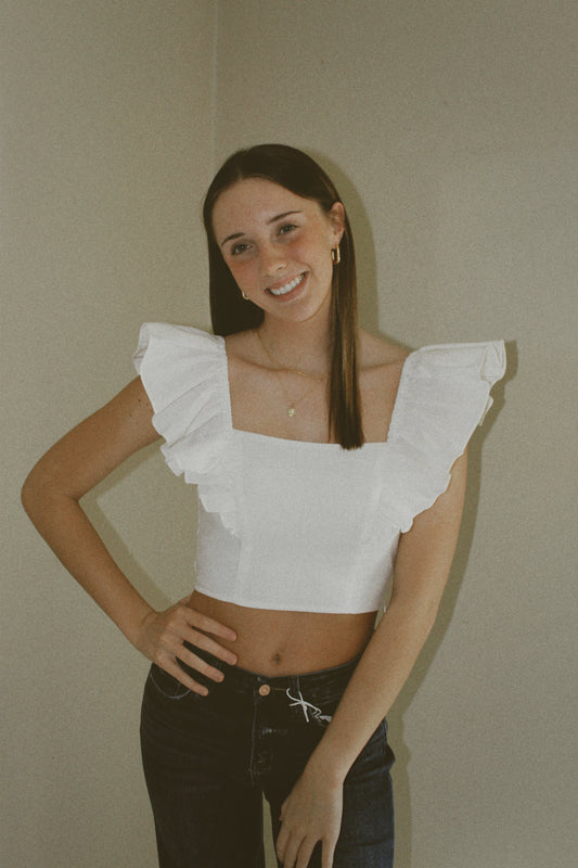 Mustard Seed White Ruffle Cropped Sleeveless Shirt